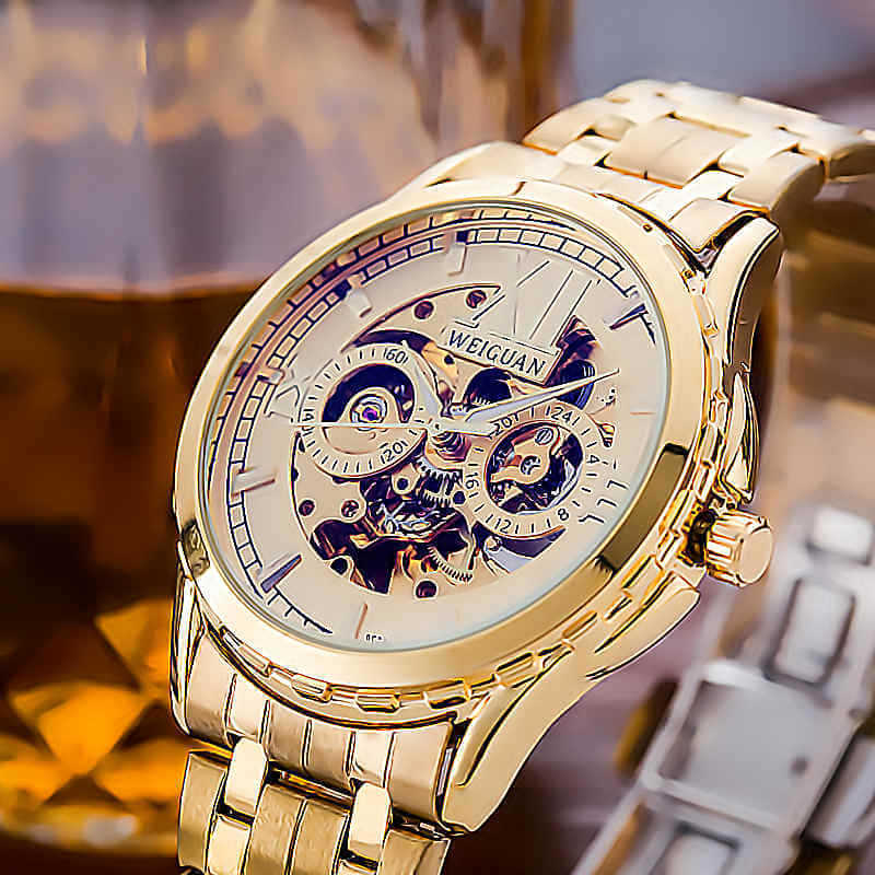 Men's Fashion Personality Hollow Luminous Waterproof watch with gold case and brown leather strap