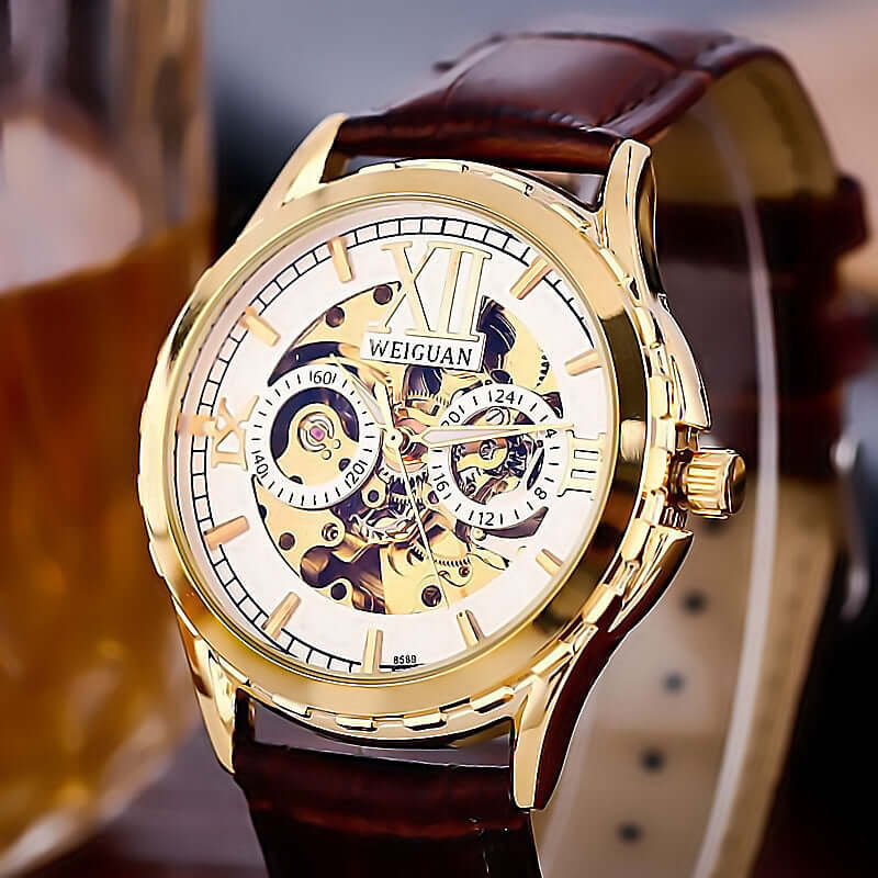 Men's Fashion Personality Hollow Luminous Waterproof watch with gold case and brown leather strap