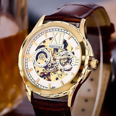 Men's Fashion Personality Hollow Luminous Waterproof watch with gold case and brown leather strap